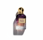 Flat-lay Bianca Unique perfume with dramatic shadow