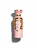 Flat-lay Bouquet of Euphoria perfume with dramatic shadow