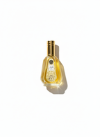 Gold perfume bottle on clean background