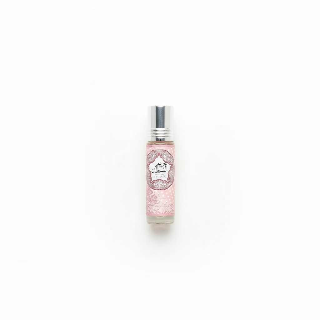 Pink perfume roller bottle on clean background